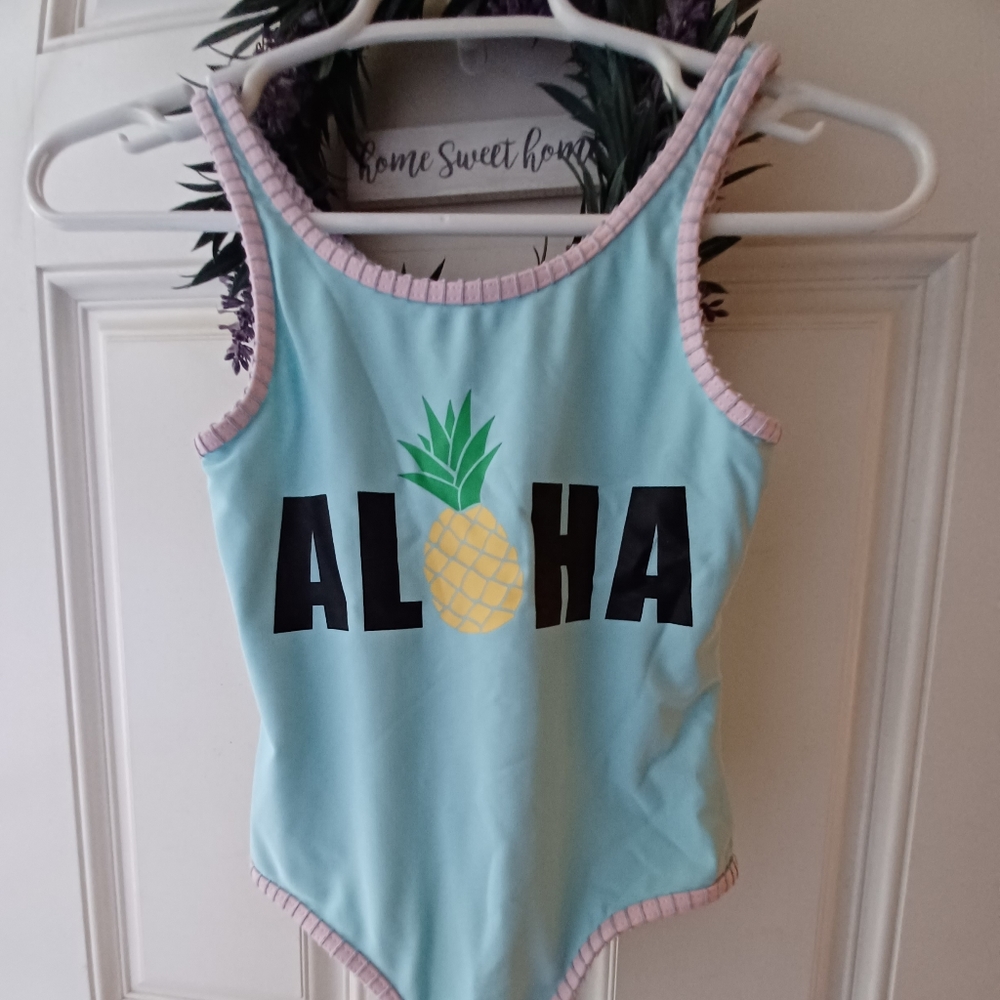 Sweet Pines One pc girls swimsuit.